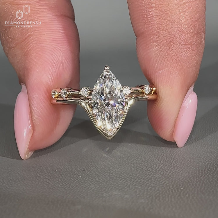 Solitaire style highlights this marquise cut wedding ring.