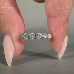 Round diamond wedding band with a sleek look.
