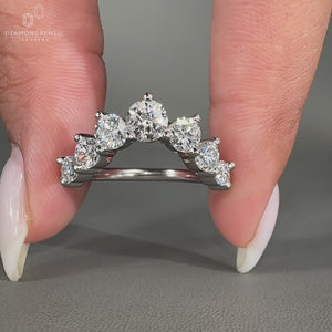 Round diamond wedding band designed for elegant everyday wear.
