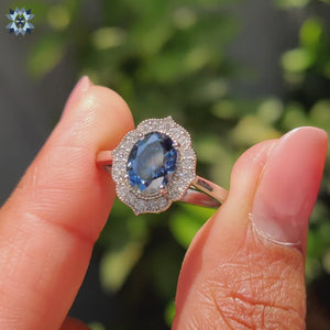 Halo setting ring featuring an Oval Cut Moissanite in a beautiful vintage style.
