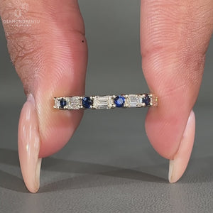 Emerald and round diamond wedding band.
