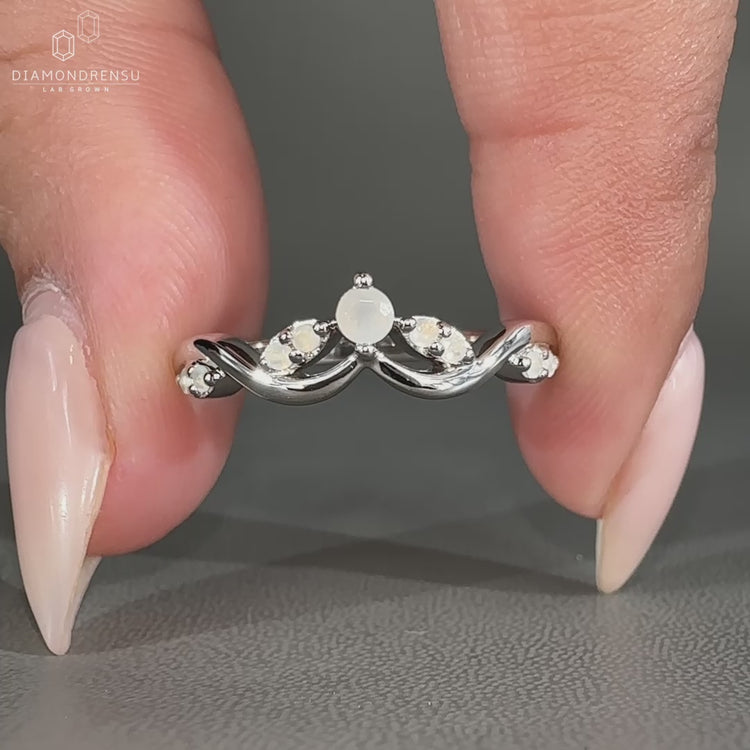 Vintage style moonstone wedding band in white gold.
