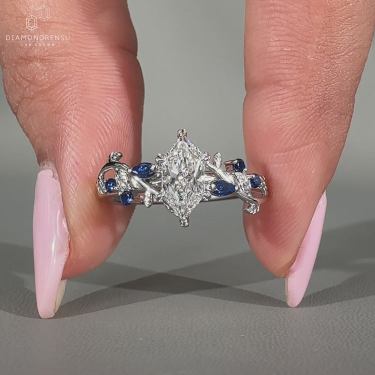 Nature inspired engagement ring with vine accents
