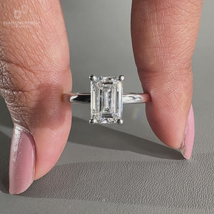 Emerald Cut Diamond Ring set in a secure prong setting.
