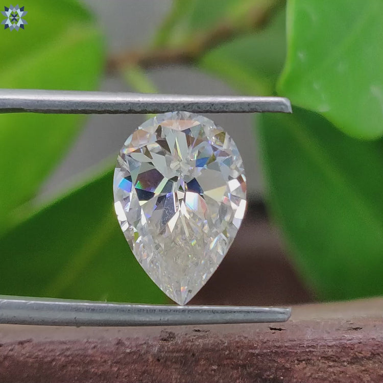 Pear rensu cut moissanite sparkling beside moissanite 3 carat.
