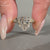 Lab grown coffin diamond ring with five stone style design.