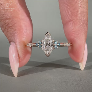 Elegant marquise diamond ring with a unique Muse Setting, exuding vintage charm.
