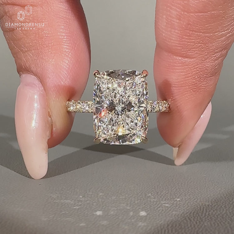 4 claw prong setting elongated cushion ring available in every metal.
