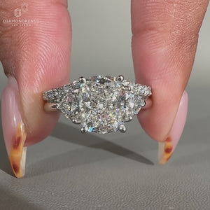 White gold bridal set featuring a cushion center and 2 trillion side stones for added brilliance.
