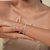Round diamond tennis bracelet for women.

