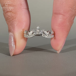 Marquise diamond wedding band with nature-inspired design.
