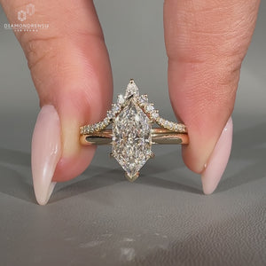 Dutch marquise solitaire ring with hidden halo