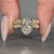 Marquise and round side stones with vintage style and milgrain details.
