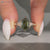 Hexagon shape diamond ring with trillion side stones.