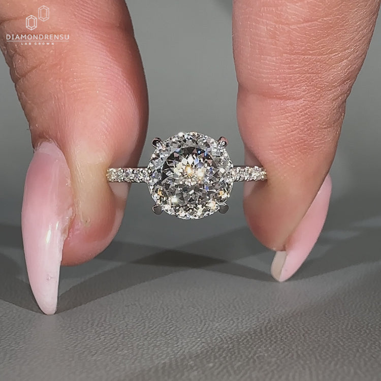 Handmade Portuguese cut ring with four claw prong setting.