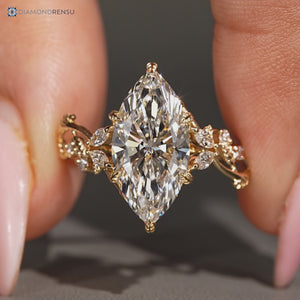 Marquise and round side stones paired with a cluster setting.