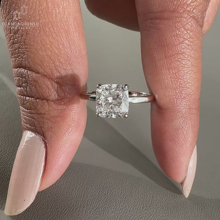 A hidden halo ring featuring sparkling diamonds for a subtle yet stunning look.
