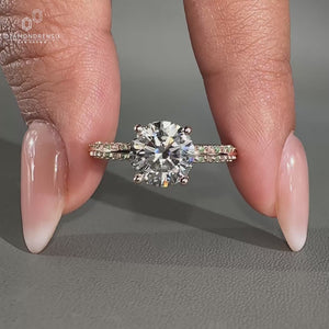 Round diamond engagement ring with exquisite rose gold ring jewellery.
