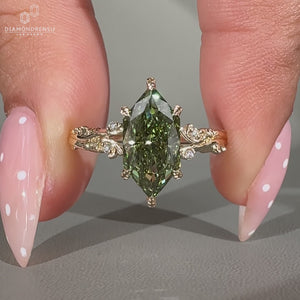 Lab grown Dutch marquise ring with Art Deco band and leaf prongs.