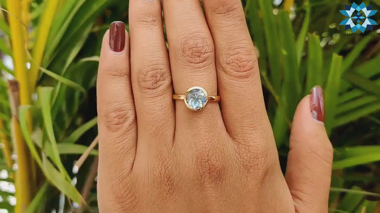 Round rose-cut moissanite ring in a vintage style.