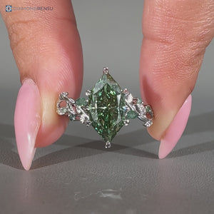 Green diamond ring with marquise and round moss agate.
