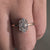 Baguette and Round Cut Diamond Cluster Halo Engagement Ring