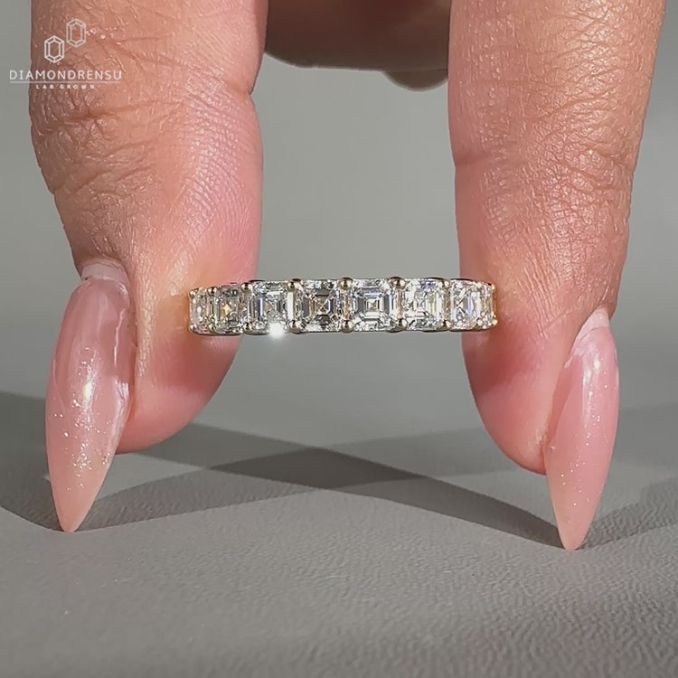 Handmade Asscher cut diamond wedding band.