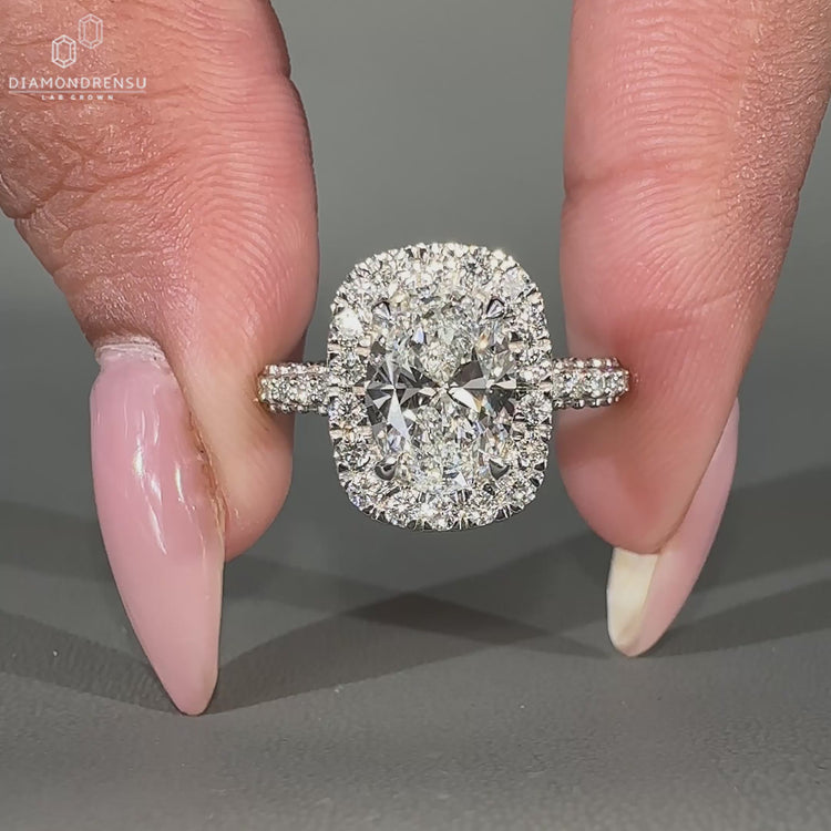 Oval engagement ring featuring a sparkling lab grown diamond.
