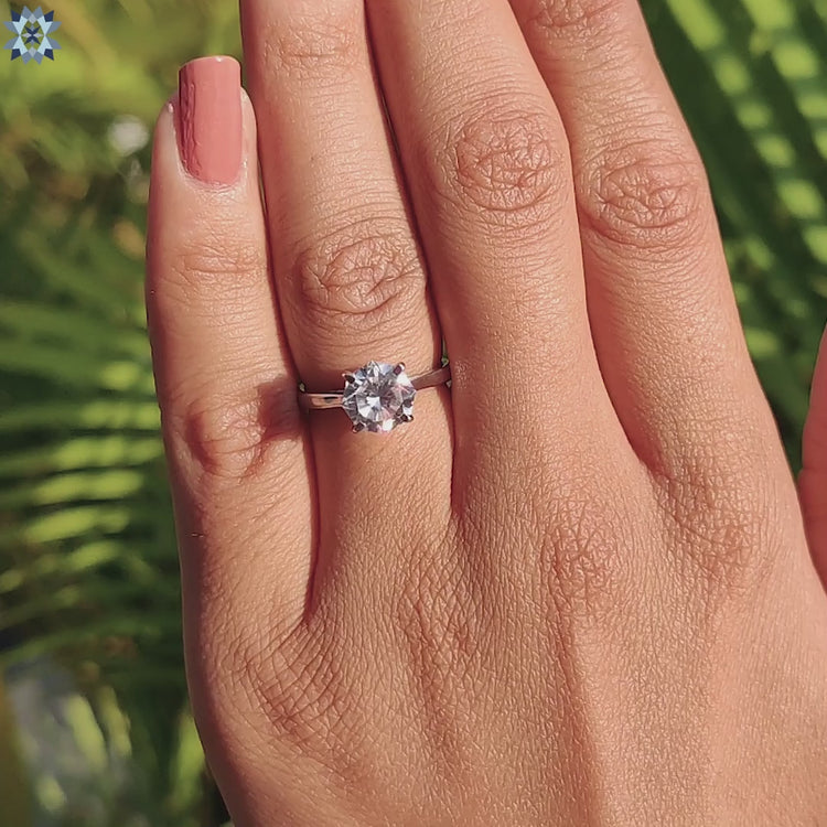 Solitaire engagement ring with a classic design and Hidden Infinity feature.
