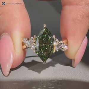 Green Dutch marquise diamond ring with twisted shank.