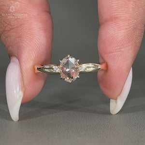 2 round diamond side stone ring adding extra shine and beauty.

