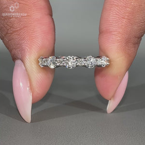 Elegant round diamond wedding band for a classic look.
