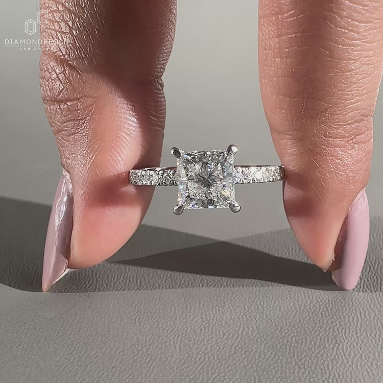 White gold ring with pave setting offers elegant sparkle.
