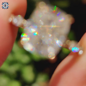 Marquise and round side stones add extra shimmer.
