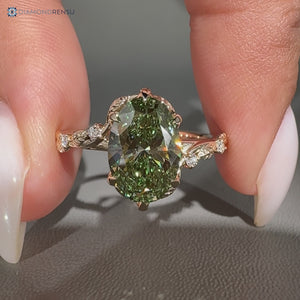 Nature inspired oval engagement ring in green.
