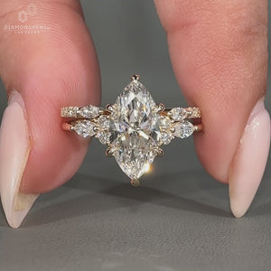 Marquise center stone highlights this ring wedding band with seven stone style.