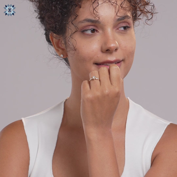 IGI certified lab-grown diamond round engagement ring with floral patterns and yellow gold setting