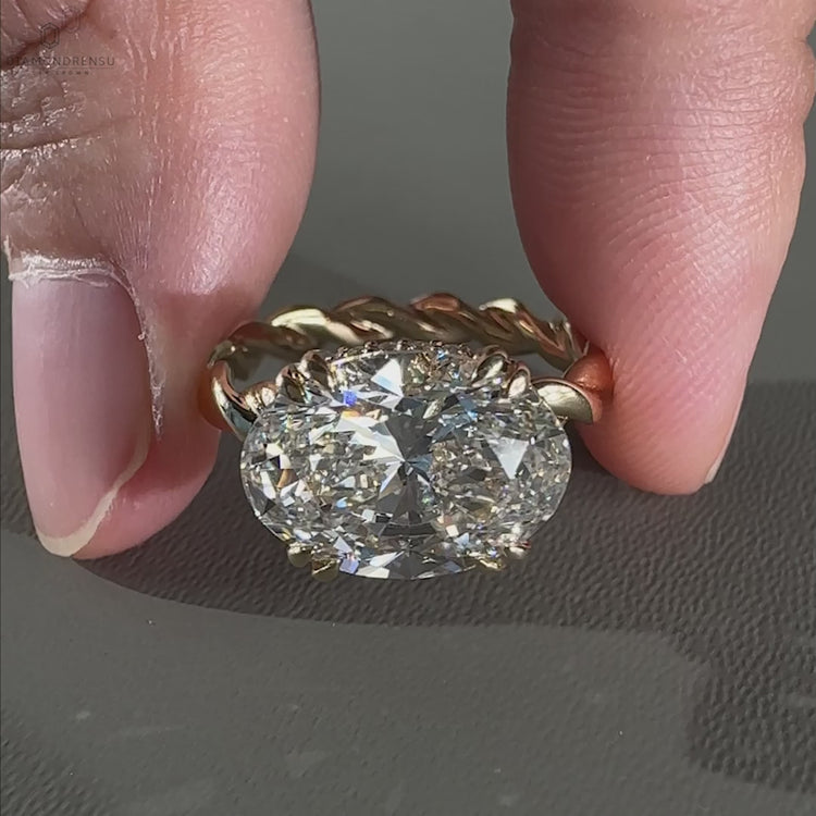 East West Diamond Ring with an IGI certified east west ring setting.
