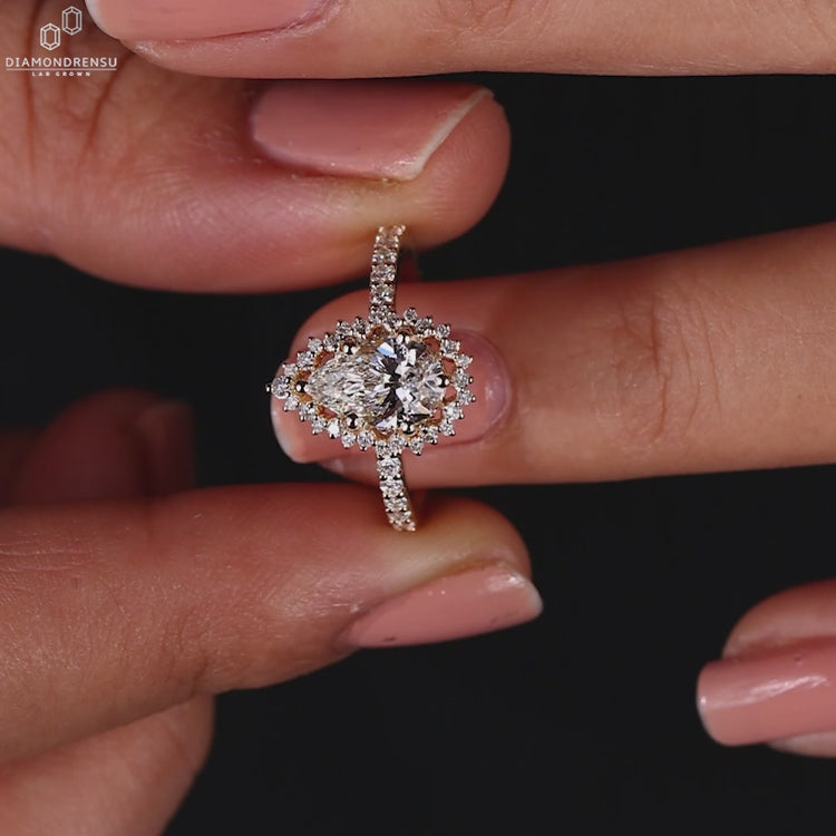 Pear Shaped Engagement Ring in a stunning halo design.