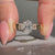 Oval cut diamond ring with five stone style.