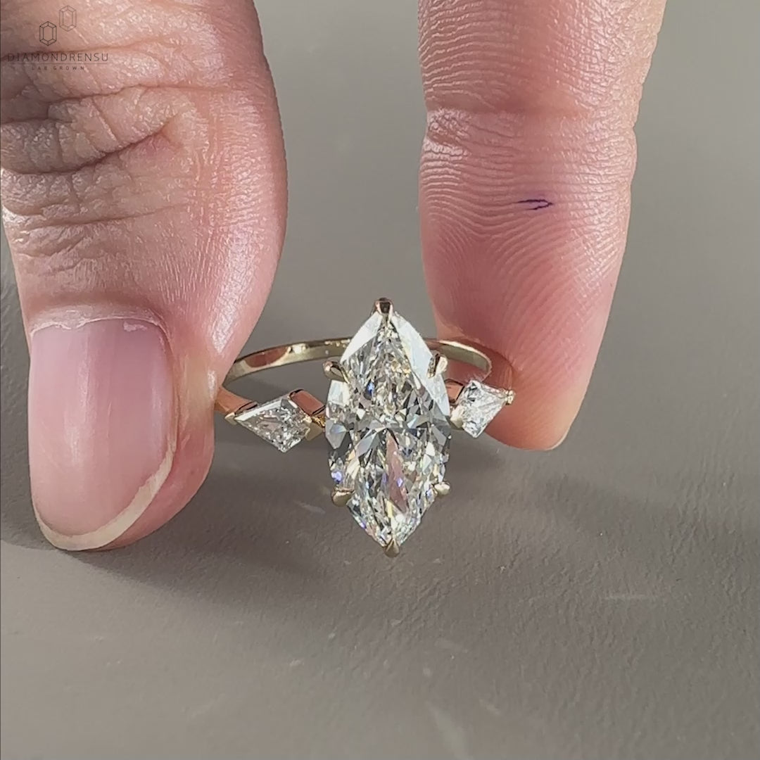 A close-up view of a unique ring for women featuring a marquise-cut diamond.
