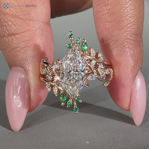 Marquise and round side stones with nature inspired style.