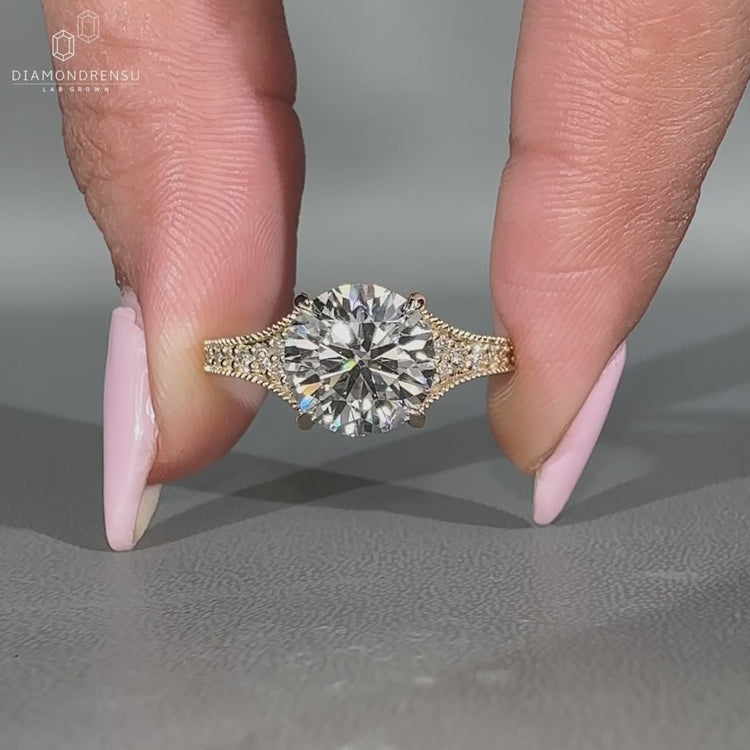 Milgrain setting ring crafted in yellow gold.
