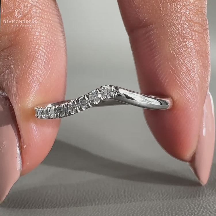 Chevron wedding band in white gold with a sleek design.
