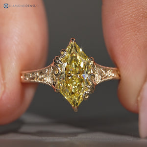 Yellow Dutch marquise diamond ring with Art Deco style.