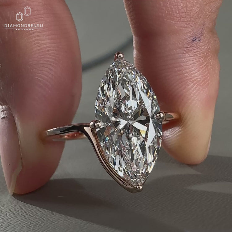 Marquise Cut Diamond Ring in a timeless prong setting.