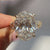 IGI Certified 5 Carat Oval Diamond Ring in Cluster Setting