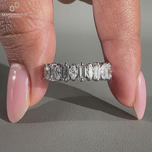 Marquise and baguette wedding band in a stunning design.
