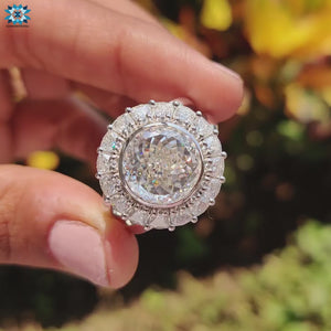 Split shank ring with a stunning Portuguese cut moissanite set in luxurious white gold.