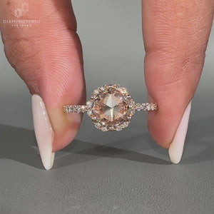 Round rose cut ring featuring pave setting and halo diamond.
